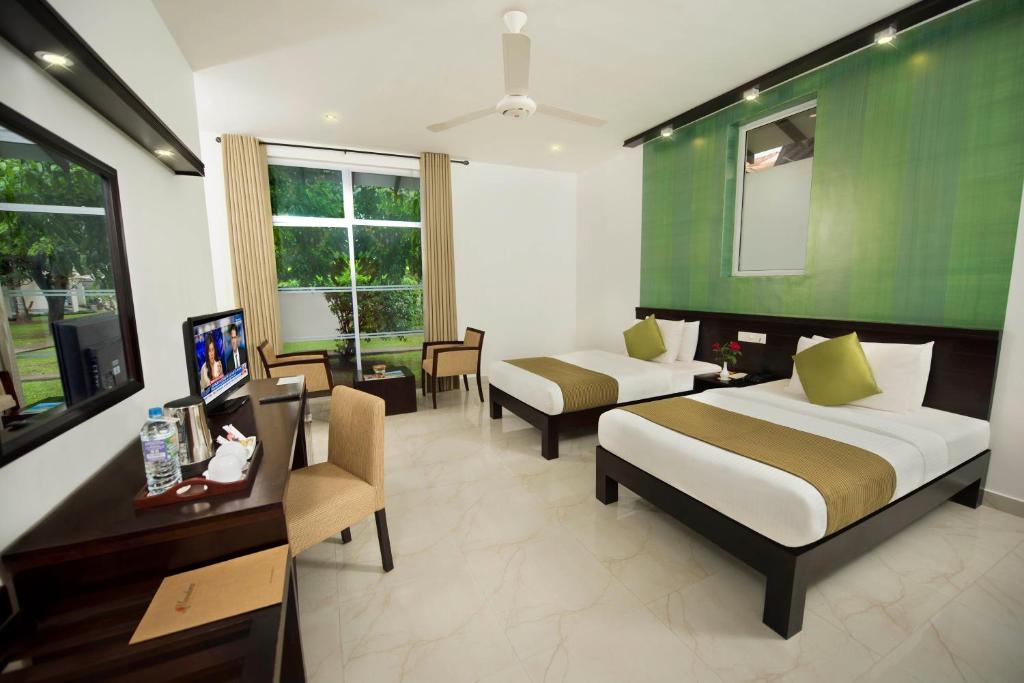 Twin Deluxe Room - Triple Occupancy